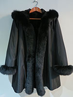 Reversible black sheared mink coat with fox trim and hood