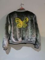 Metallic silver mink bomber with butterfly motif 